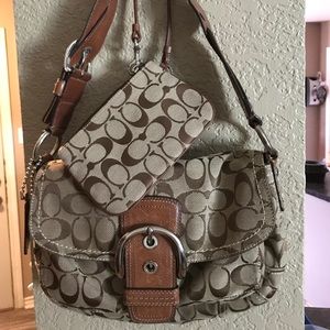 Coach purse with Coach wristlet.
